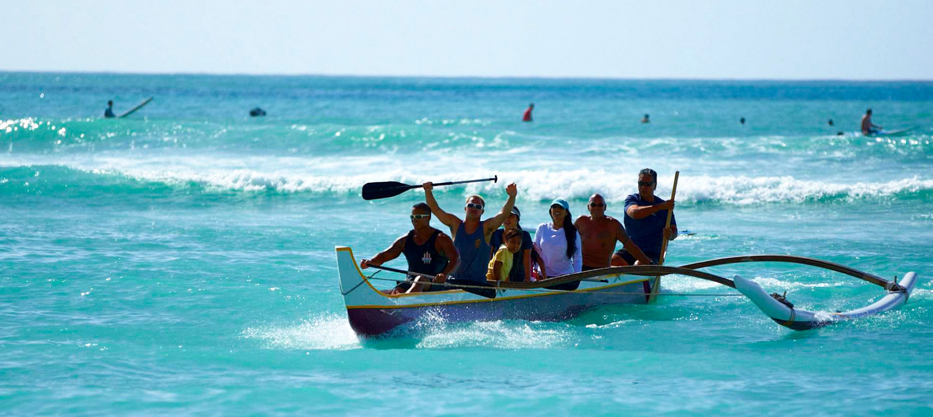 People in a canoe in the ocean